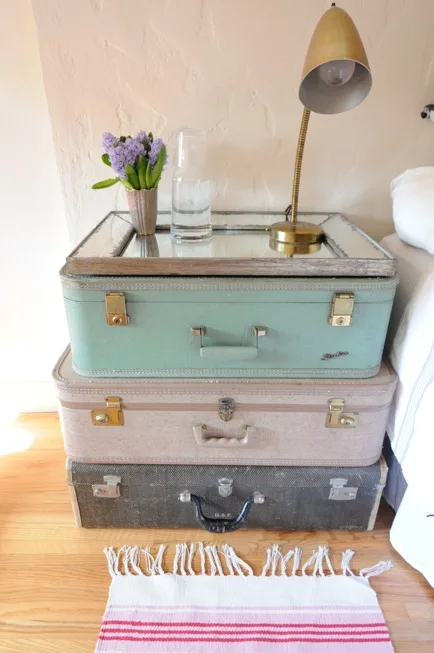 Stacked Vintage Suitcase Nightstand | DIY Ways To Upcycle Vintage Suitcases | vintage suitcase