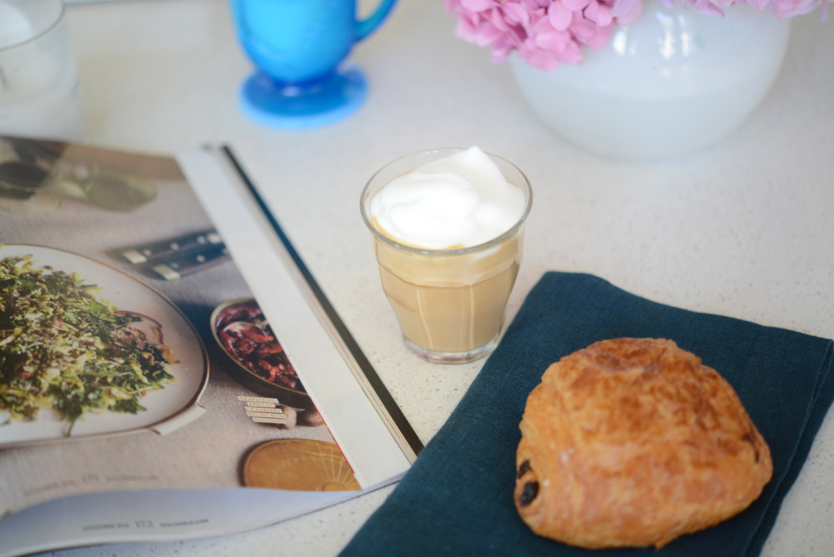 Chocolate croissants, frothy lattes, and magazines fuel the brainstorm. 