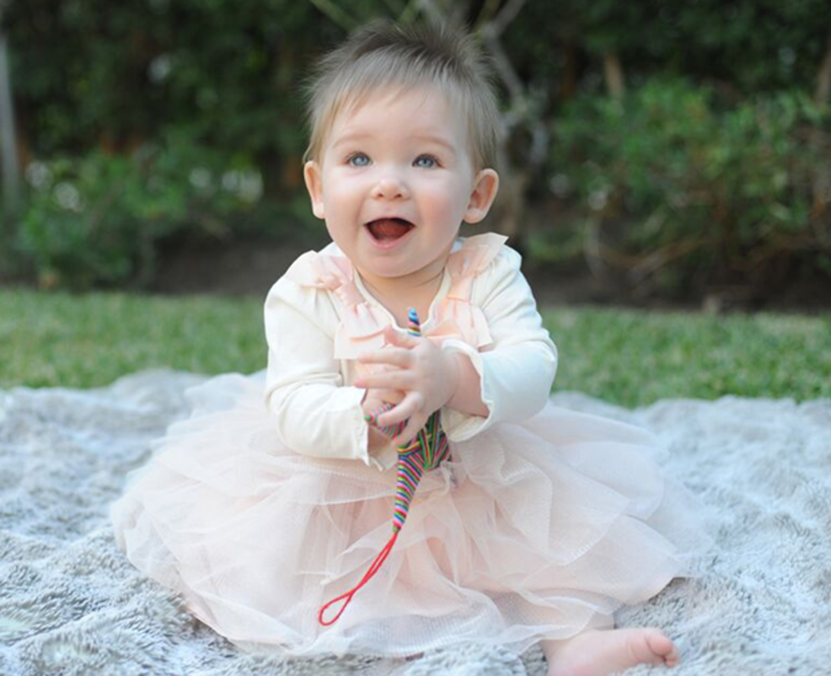 Sloan's clearly a fan of her first tulle skirt, paired with a bow top.