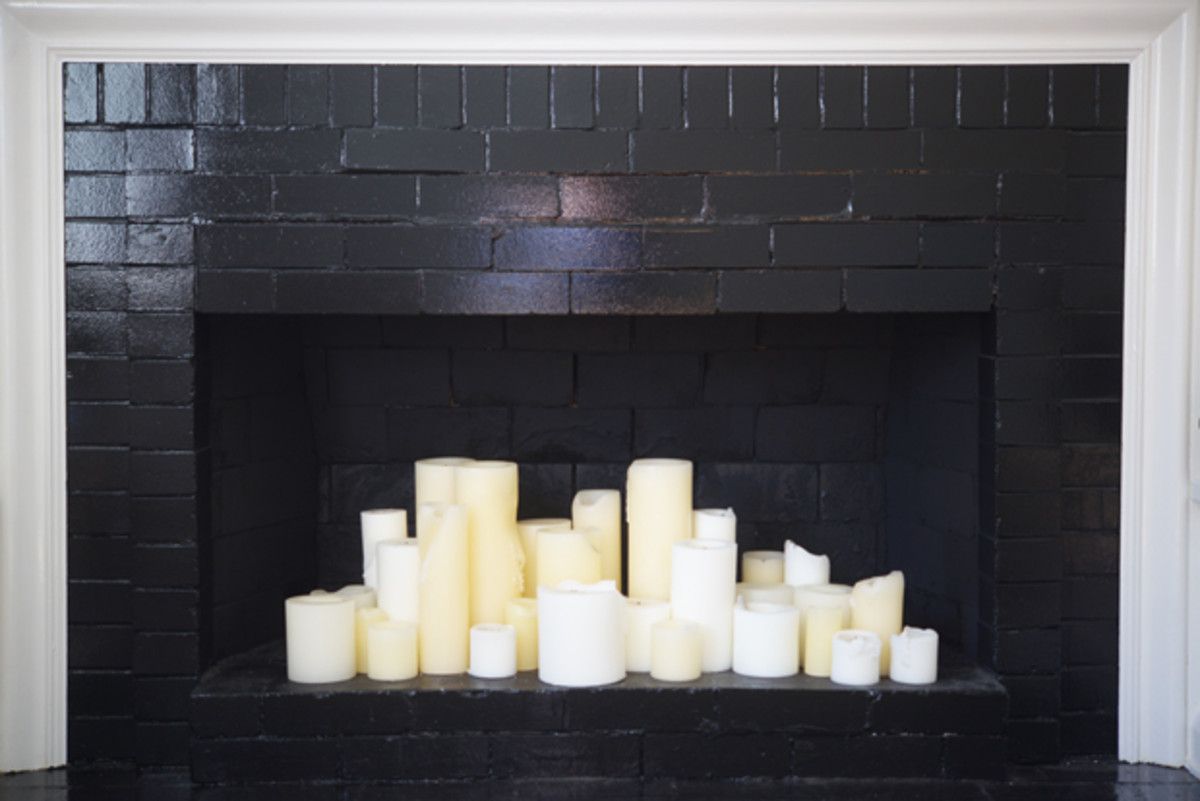  {Old pillar candles, new fireplace}