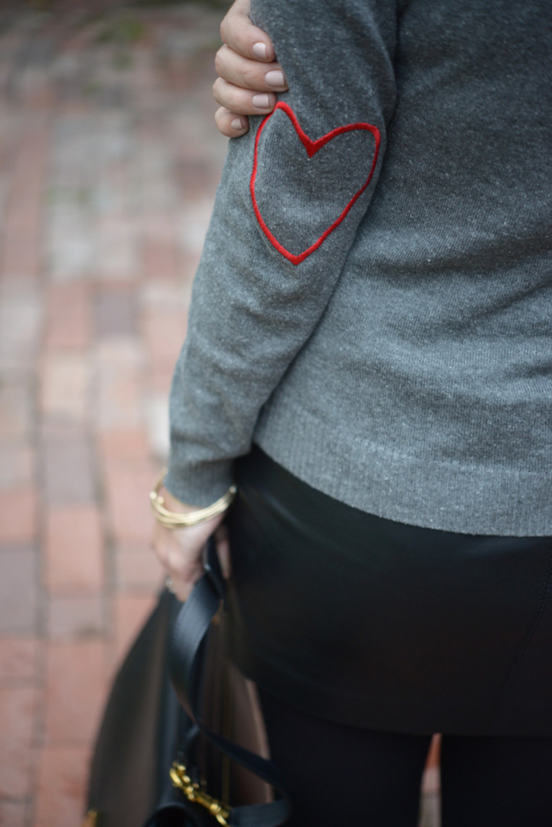  {A sweater with heart elbow patches}