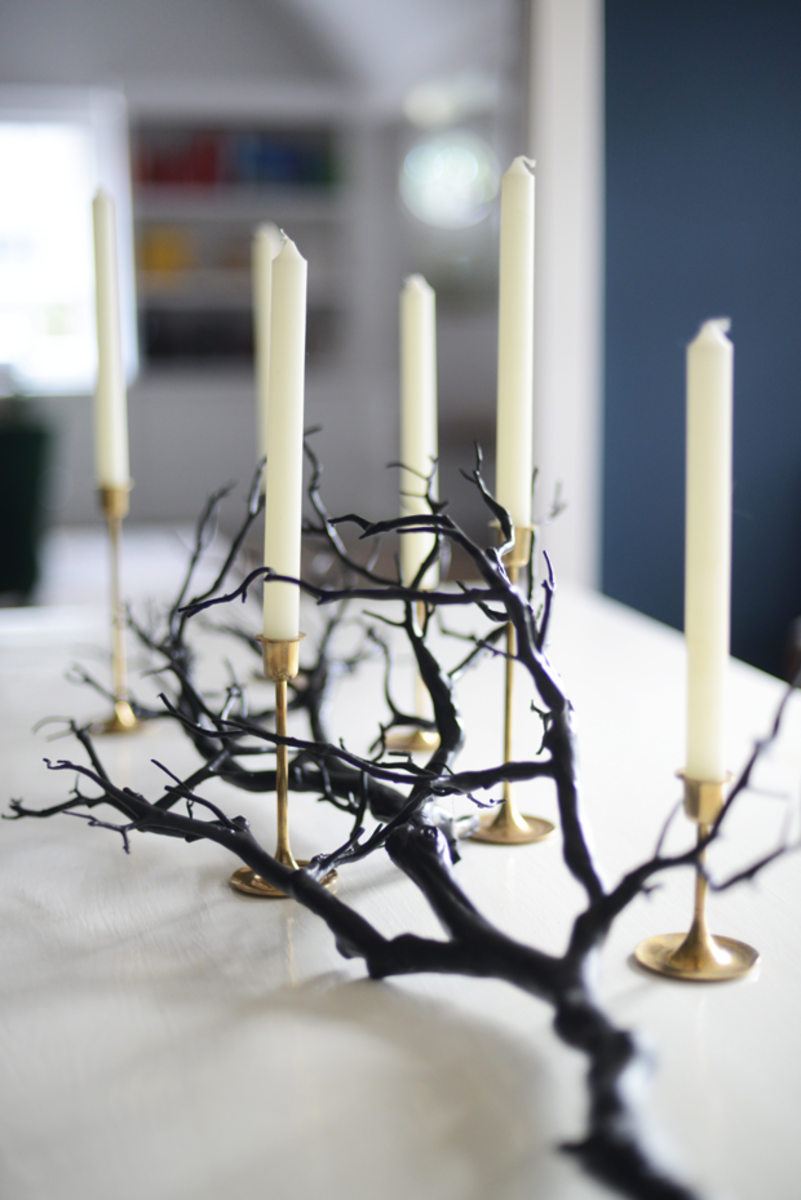  {Branch with candles on the dining room table}