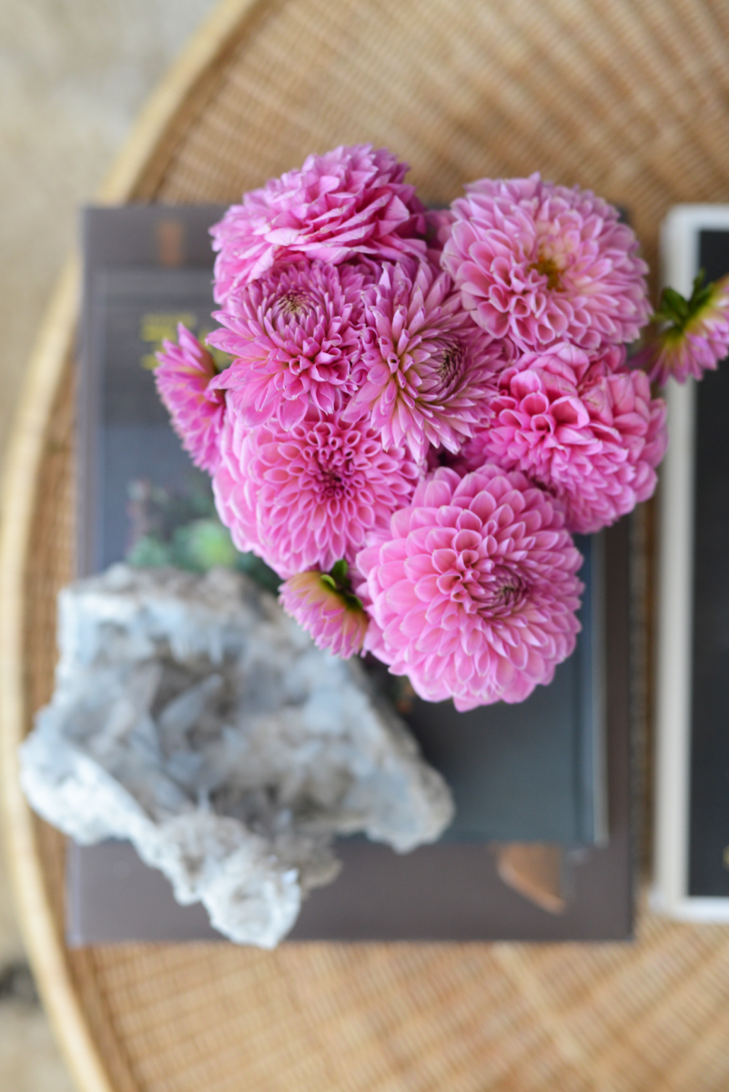 {Coffee table moment with farmers' market blooms + geode}