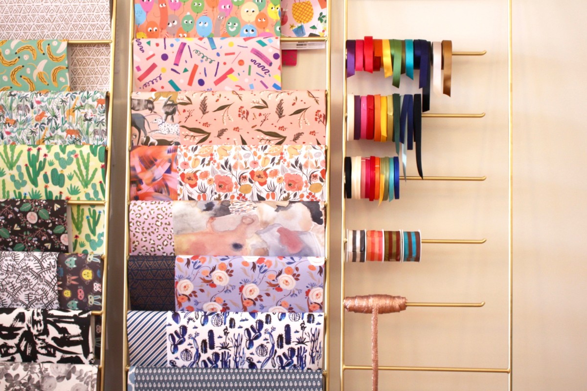 {Inspired by this display to reorganized my own wrapping supplies}