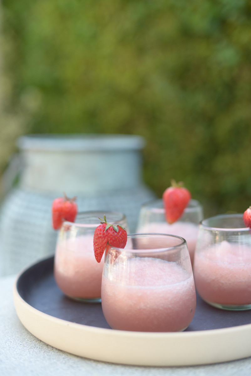 {Strawberry-rosé slushies by the fire pit, with the prettiest cups and tray}