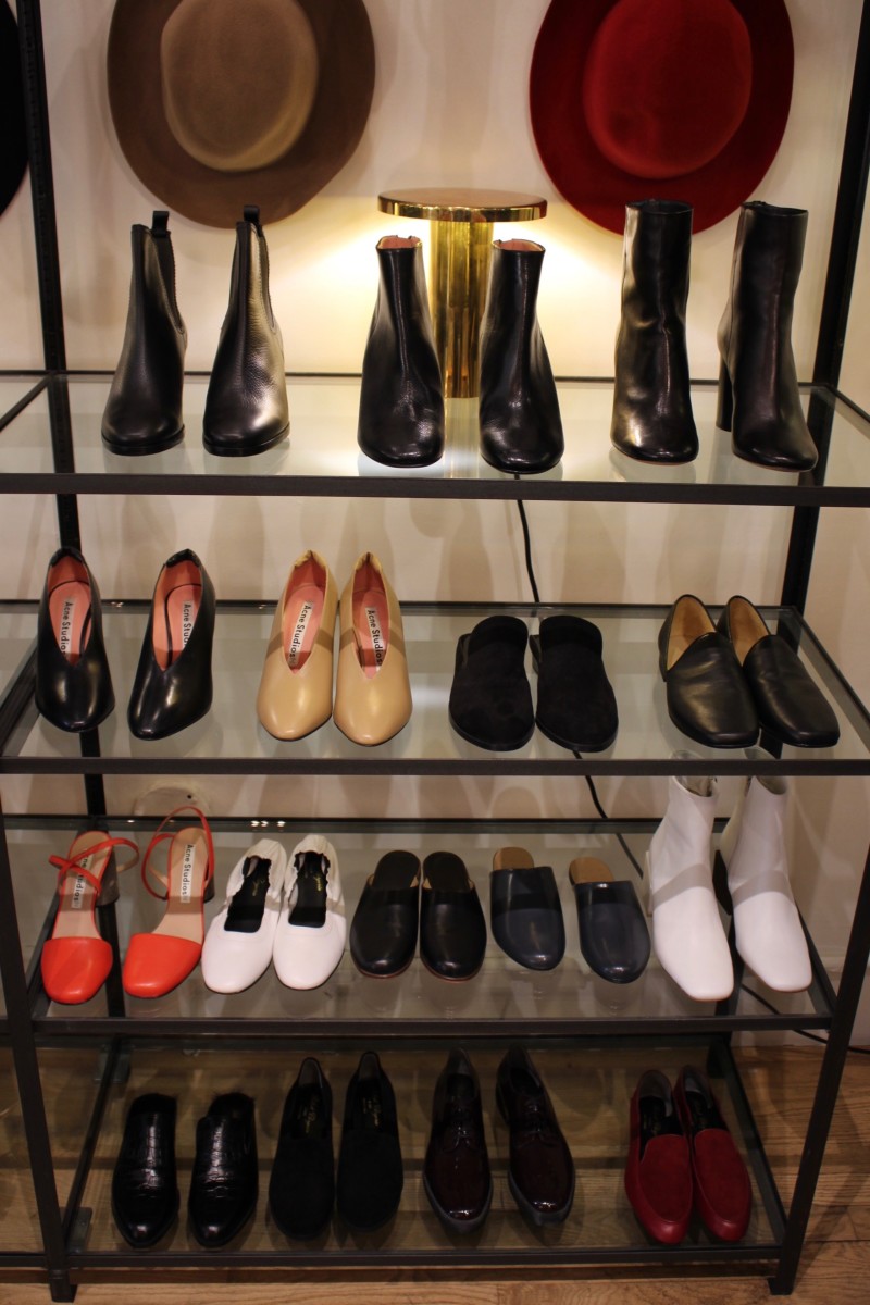 {I’ve been eyeing the Acne mule/bootie hybrid on the second shelf from the top, in camel}
