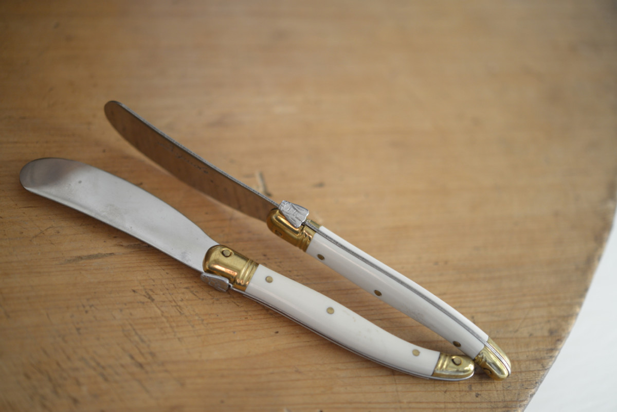 {Antique cheese knives with the cutest little bee detailing}