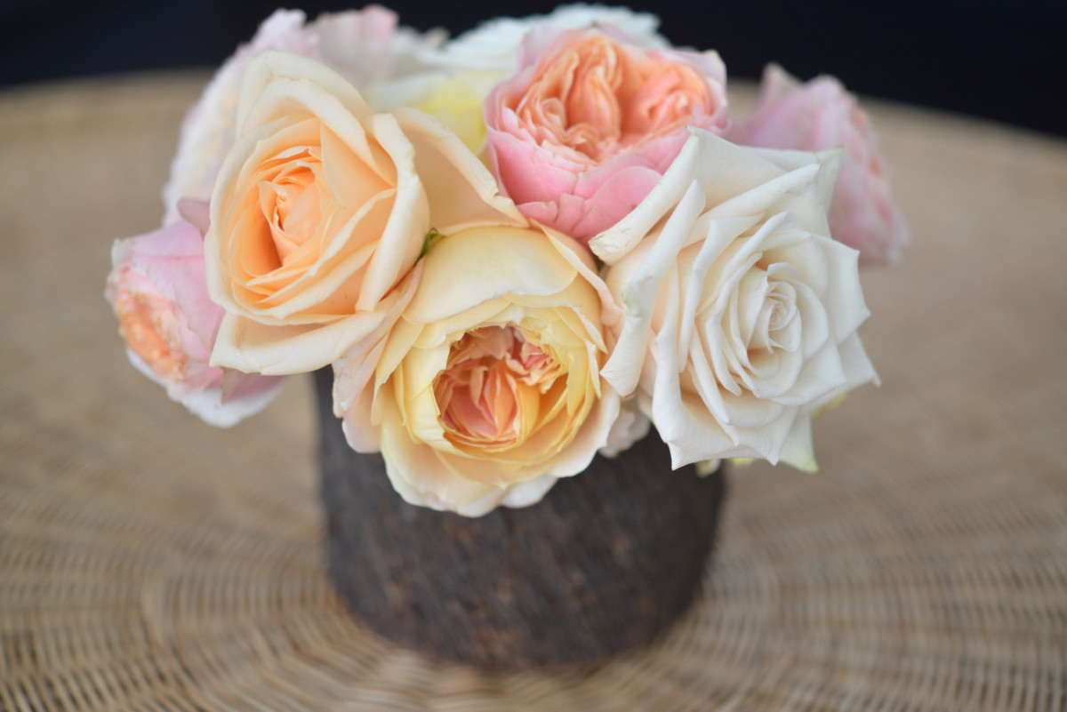 {Pastel garden roses that add a pop of color to the family room}