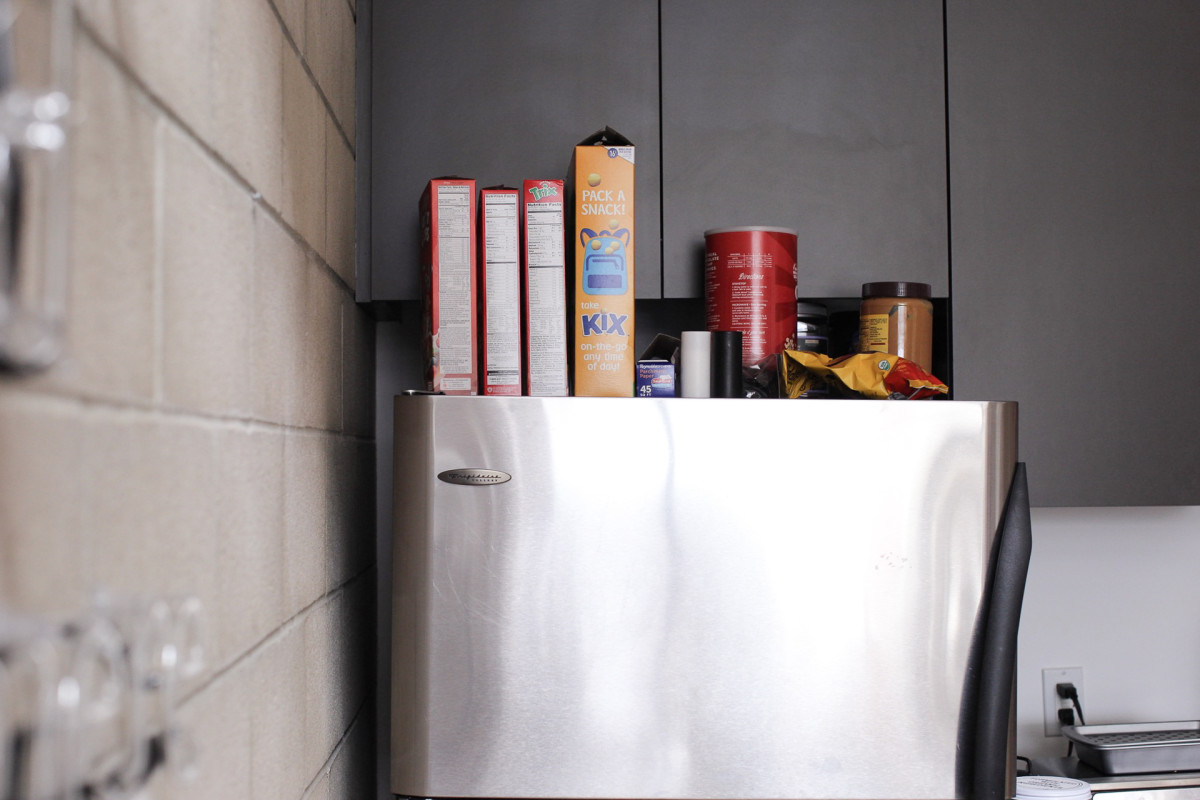 Our above-fridge area began as a place for breakfast goods, but just looked messy over time.