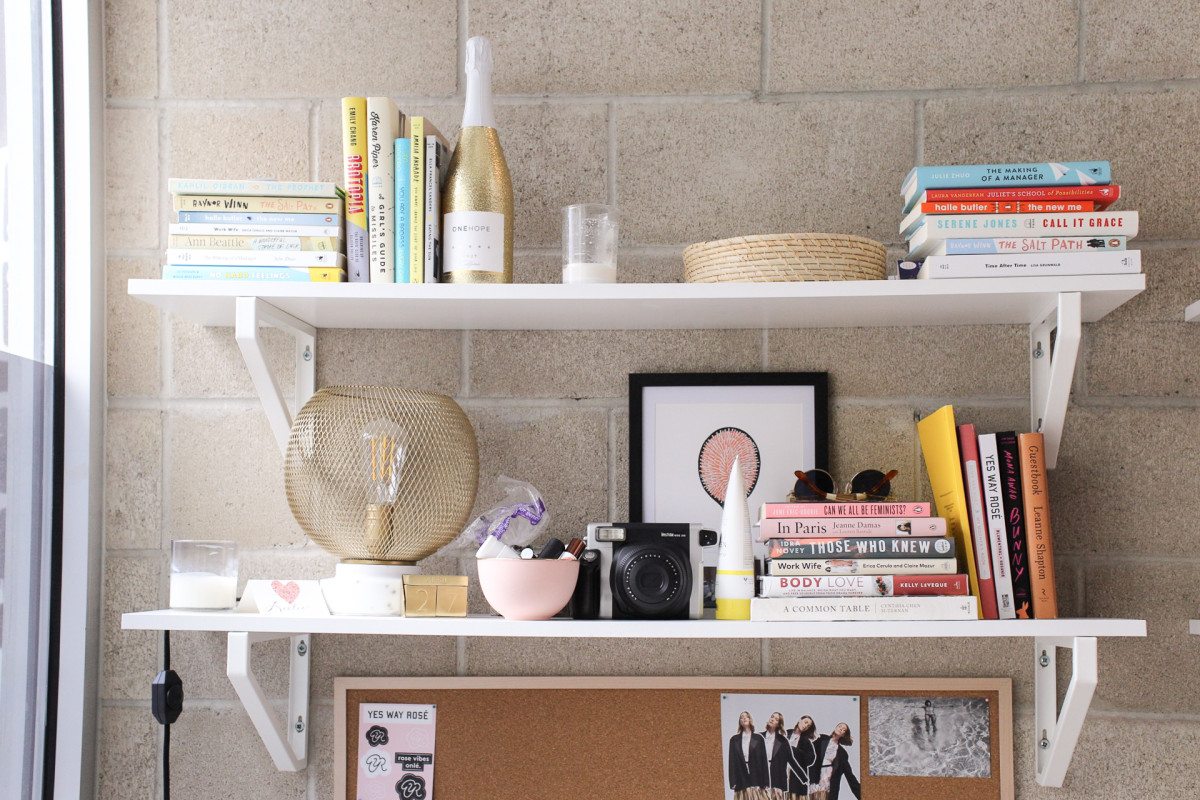 Leslie keeps her books to review for The List on the shelf above her desk, but a styled shelf can easily turn into a messy shelf. 