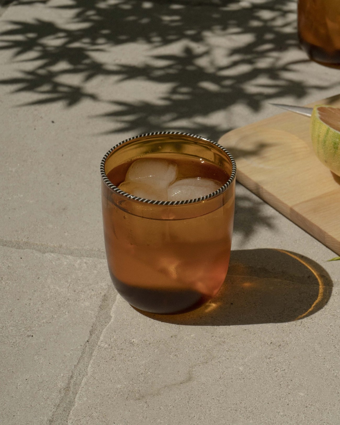 AMBER GLASS WITH BLACK AND WHITE TWISTED RIM - Shop Cupcakes and Cashmere