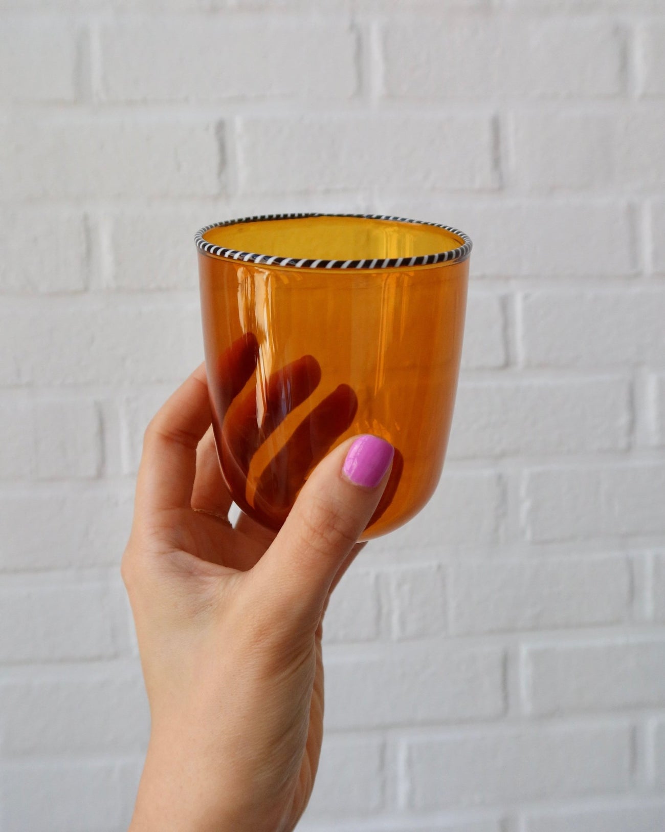 AMBER GLASS WITH BLACK AND WHITE TWISTED RIM - Shop Cupcakes and Cashmere