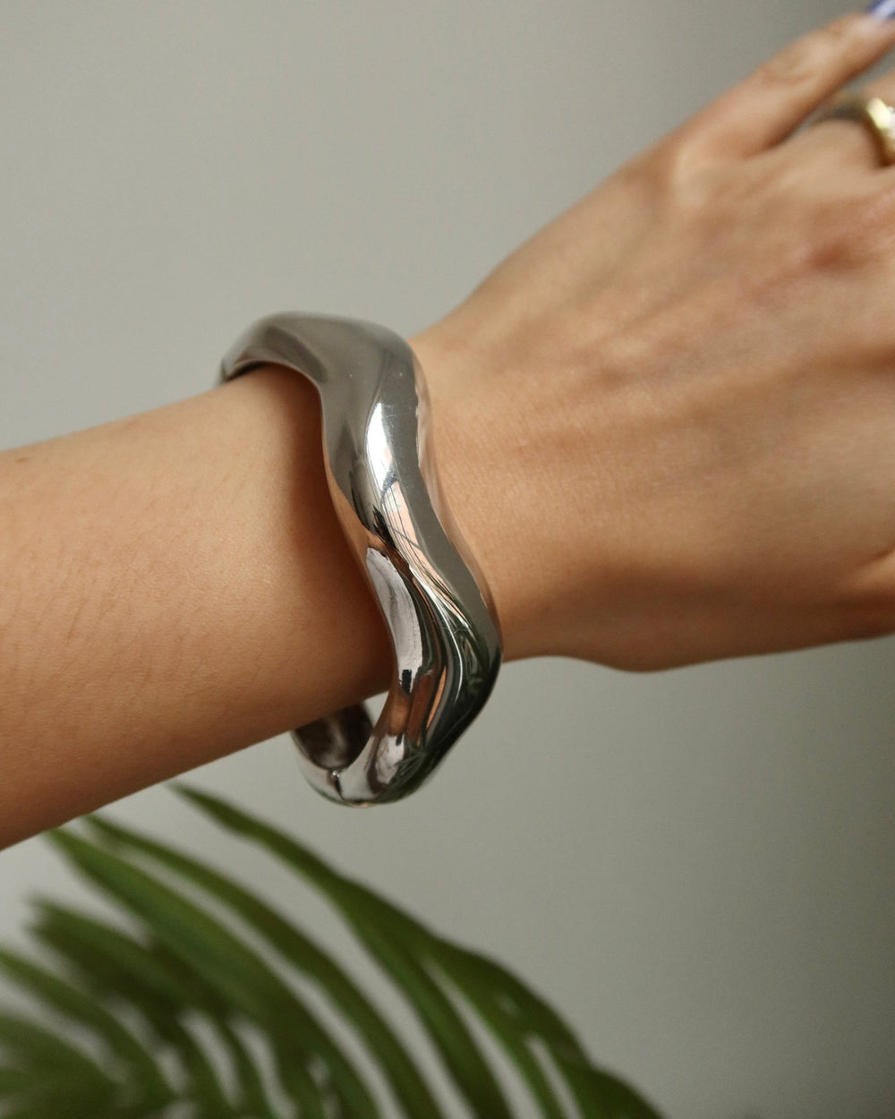 ASTRID WIDE WAVY SILVER STATEMENT BRACELET - Shop Cupcakes and Cashmere